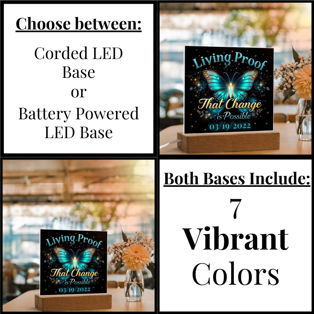LED acrylic plaque with glowing butterfly and 'Living Proof That Change is Possible' on wood base