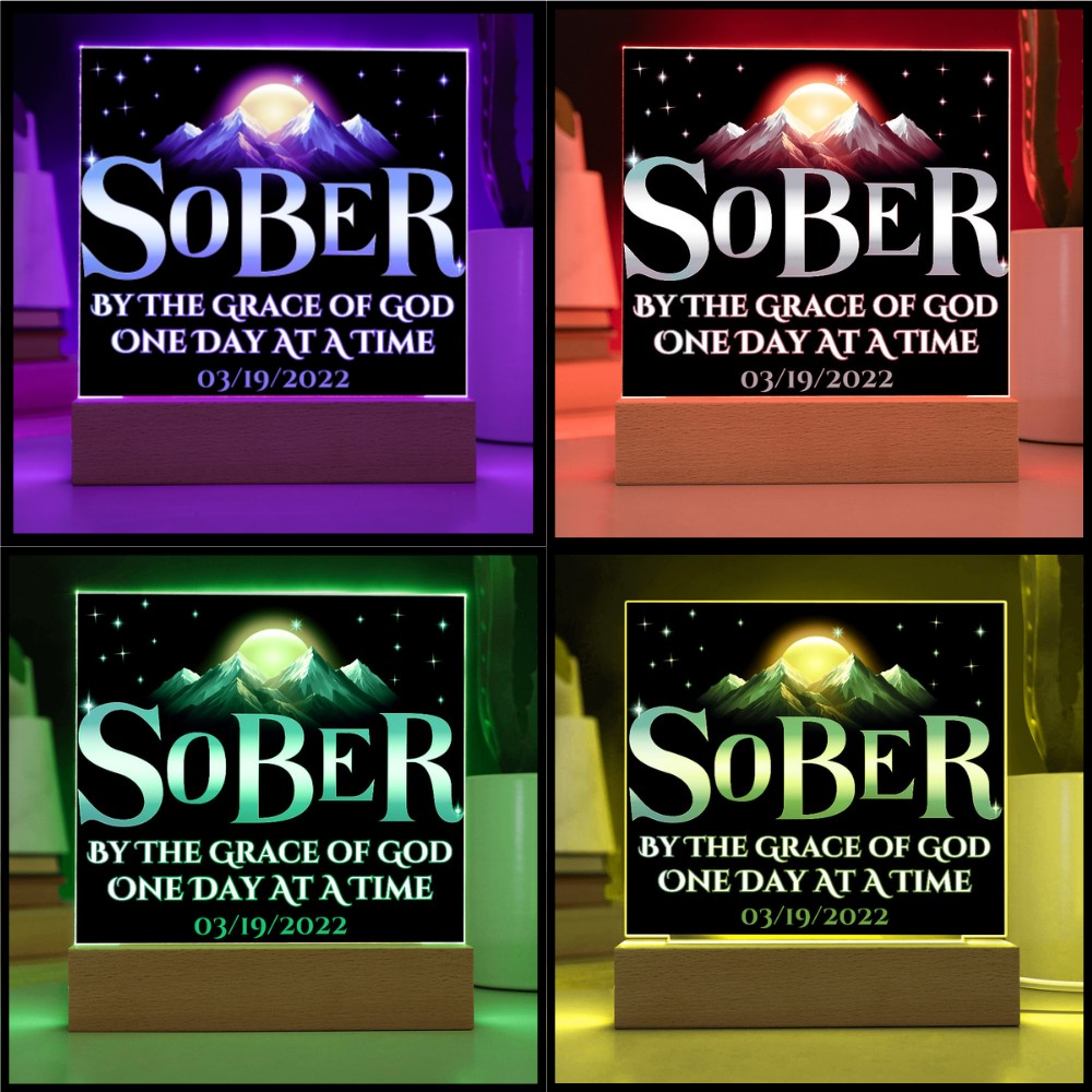 Acrylic LED plaque on a wooden base with printed memorial design and multicolor lit frames