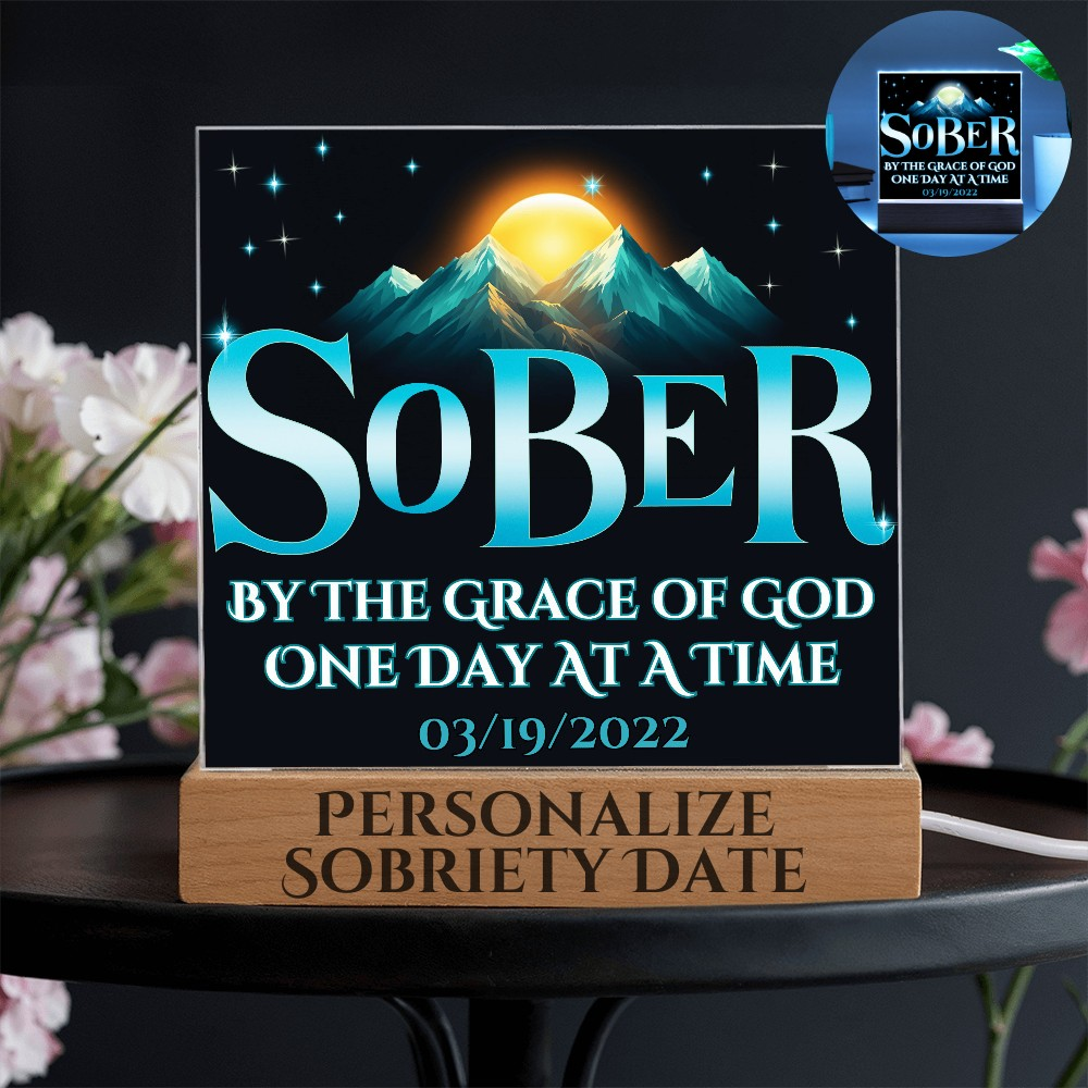 Acrylic LED plaque with printed memorial design on wooden base and glowing border light