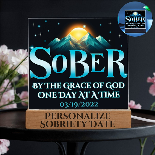 Acrylic LED plaque with printed memorial design on wooden base and glowing border light