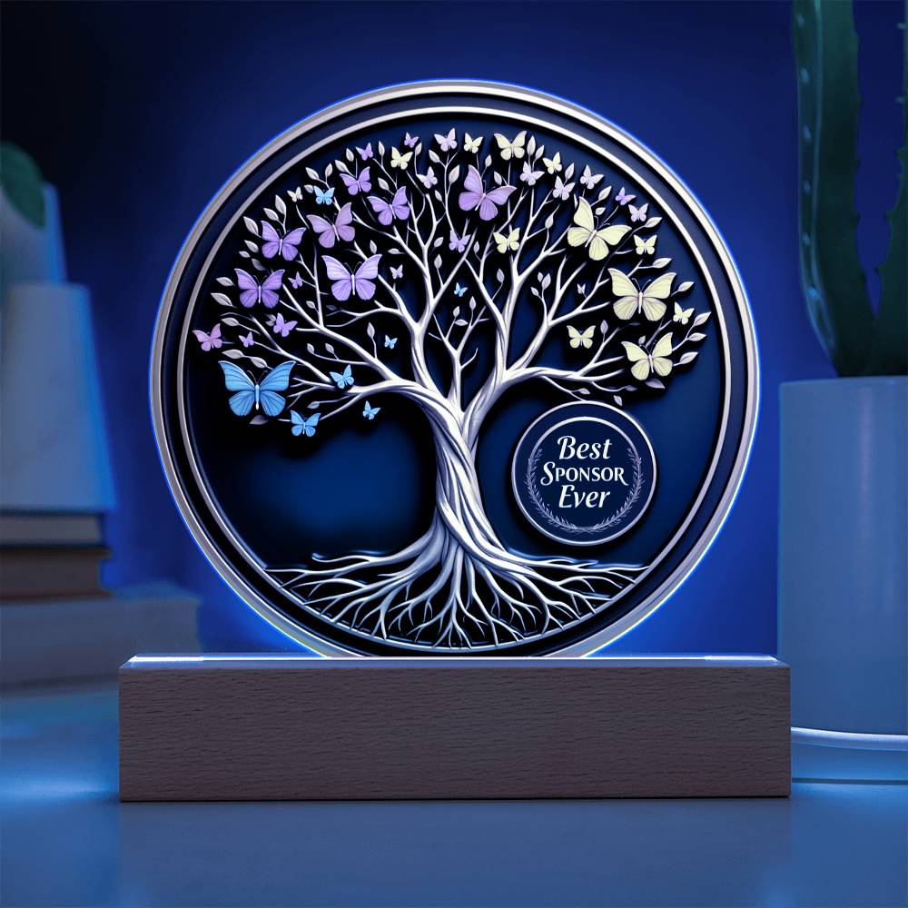 LED circle acrylic keepsake glowing blue with tree, butterflies, and “Best Sponsor Ever” badge