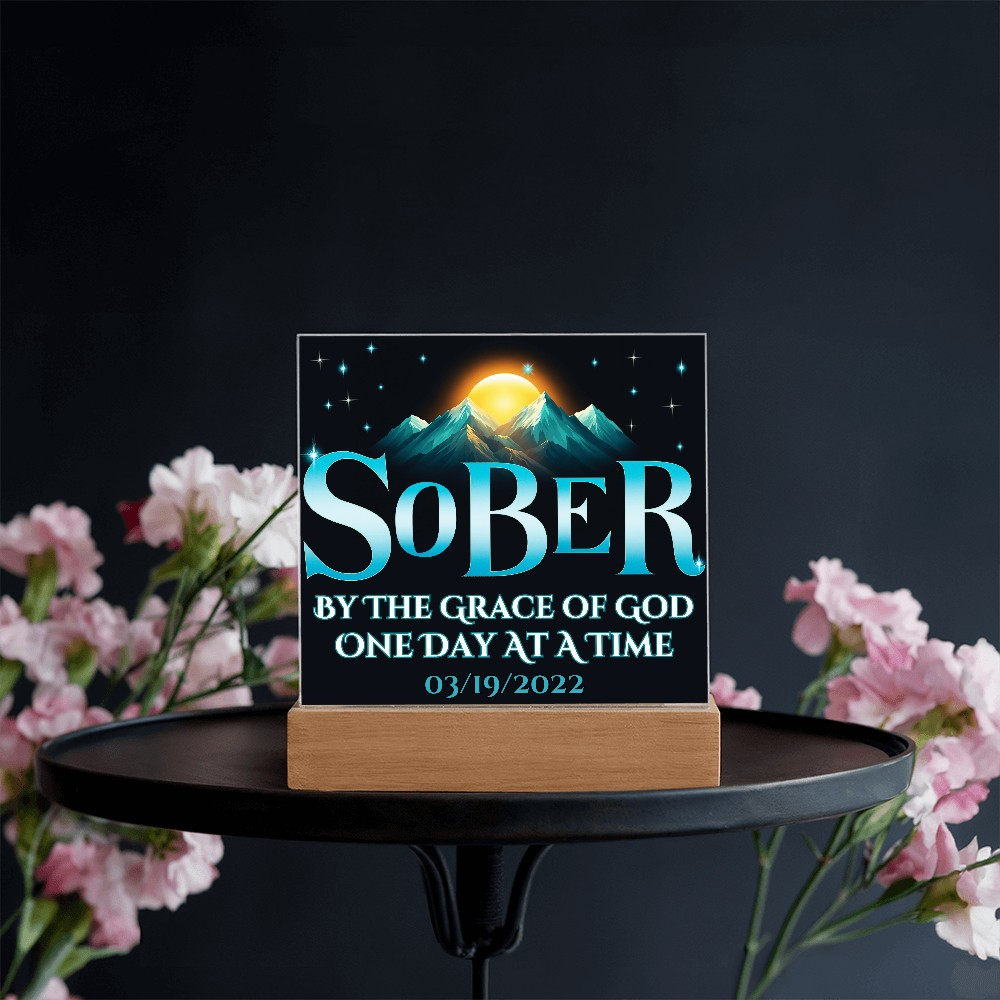 Acrylic LED plaque on a wooden base with printed memorial design and soft light glow