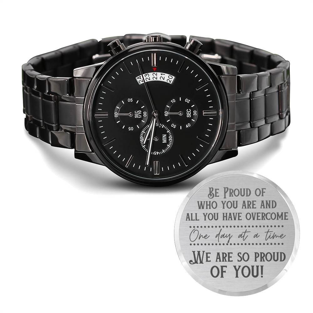 Black chronograph-style wristwatch with metal link band and round black dial