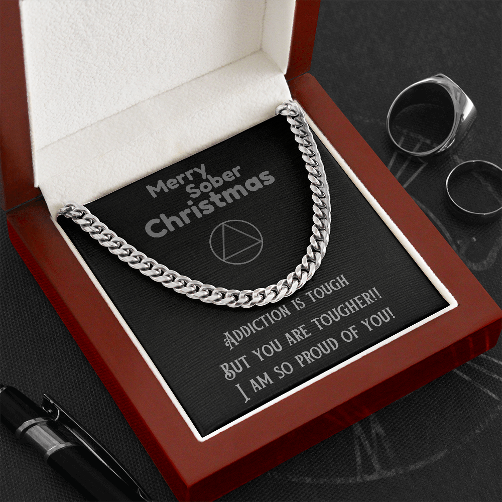 Silver Cuban link chain necklace draped in a U shape