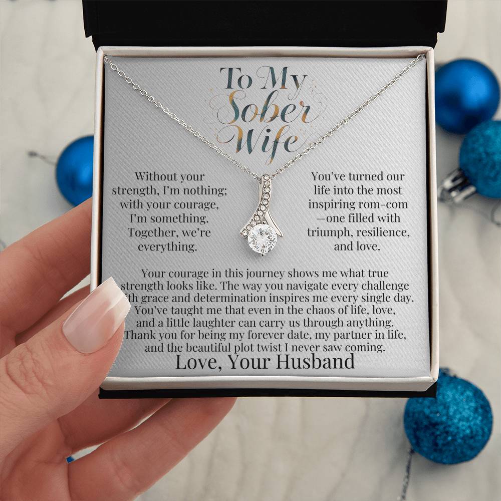 Silver-tone teardrop pendant necklace in a gift box with chain