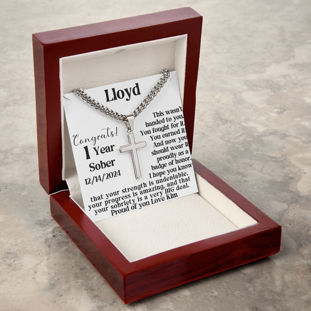Silver chain necklace with cross pendant in an open red gift box