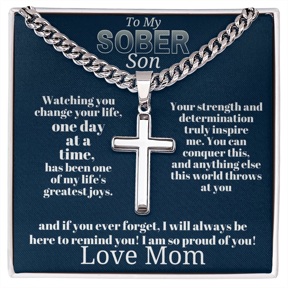 Silver-tone cross pendant necklace with curb chain and clasp