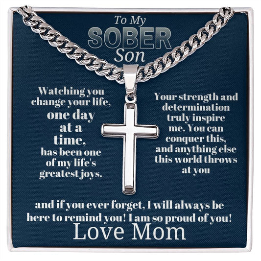 Silver-tone cross pendant necklace with curb chain and clasp