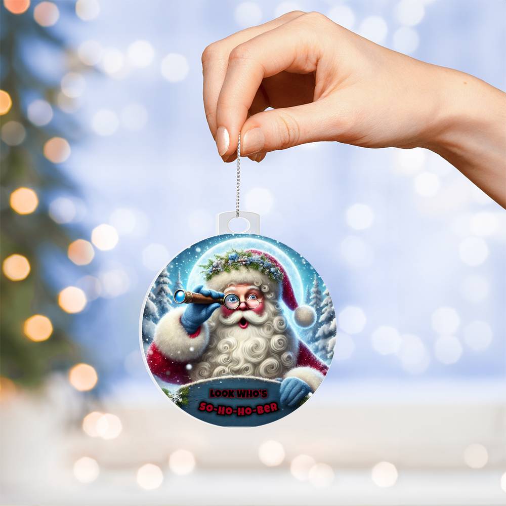 Round Santa ornament with blue telescope, red hat, and hanging silver chain