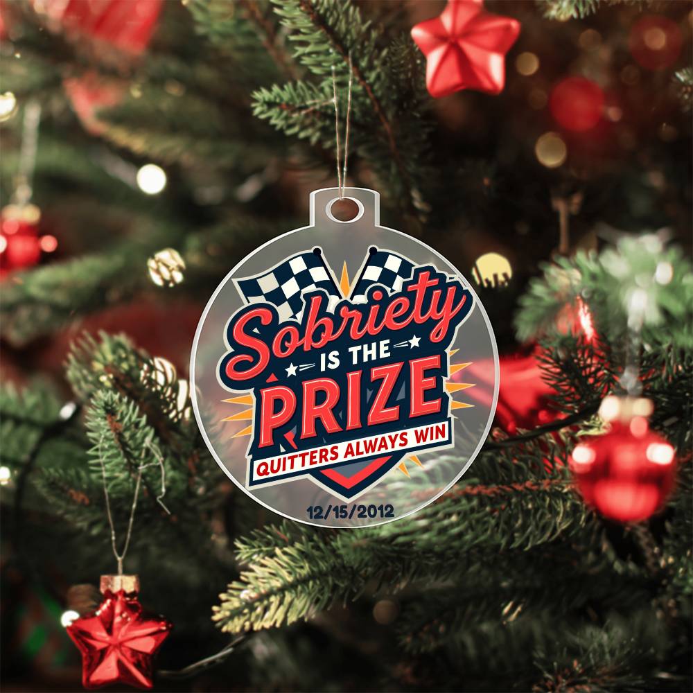 Round hanging ornament on Christmas tree with “Sobriety Is The Prize” and “Quitters Always Win”