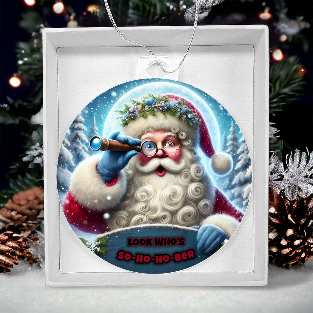 Round Santa ornament in white gift box, blue telescope and red “So-Ho-Ho-Ber” lettering
