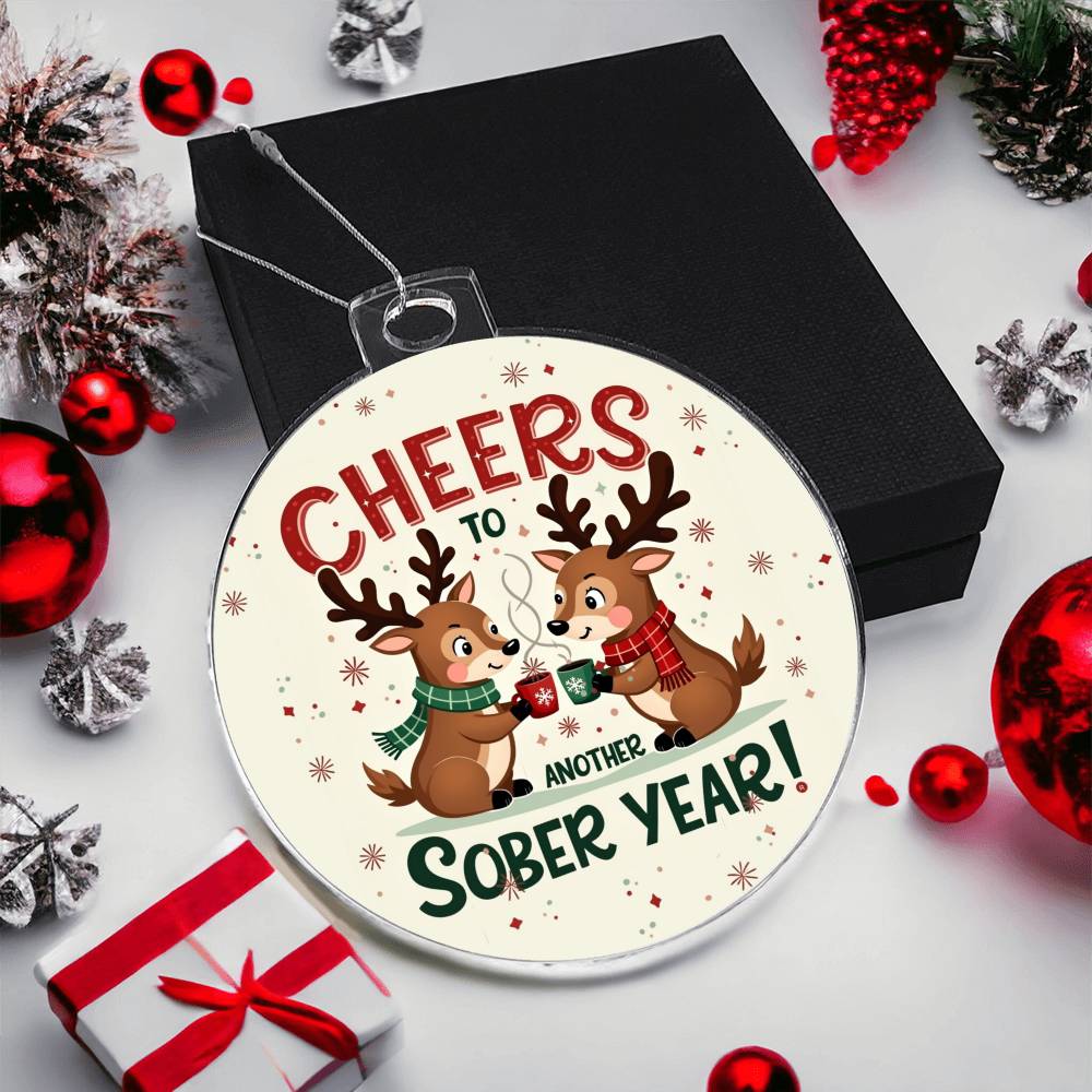 Round ornament: 'Cheers to Another Sober Year!' with reindeer and mug illustration