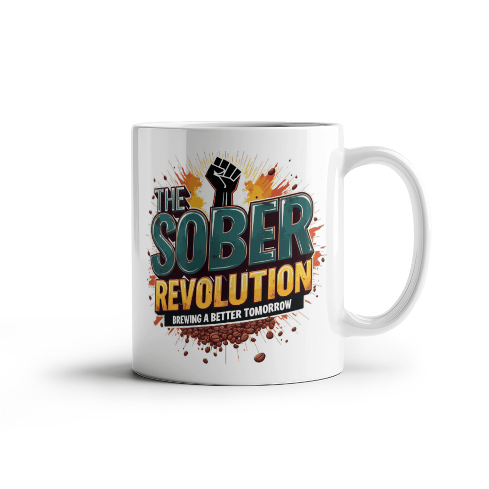 White ceramic mug with 'The Sober Revolution' text and orange splatter design