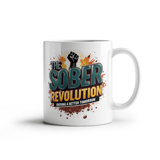White ceramic mug with 'The Sober Revolution' text and orange splatter design