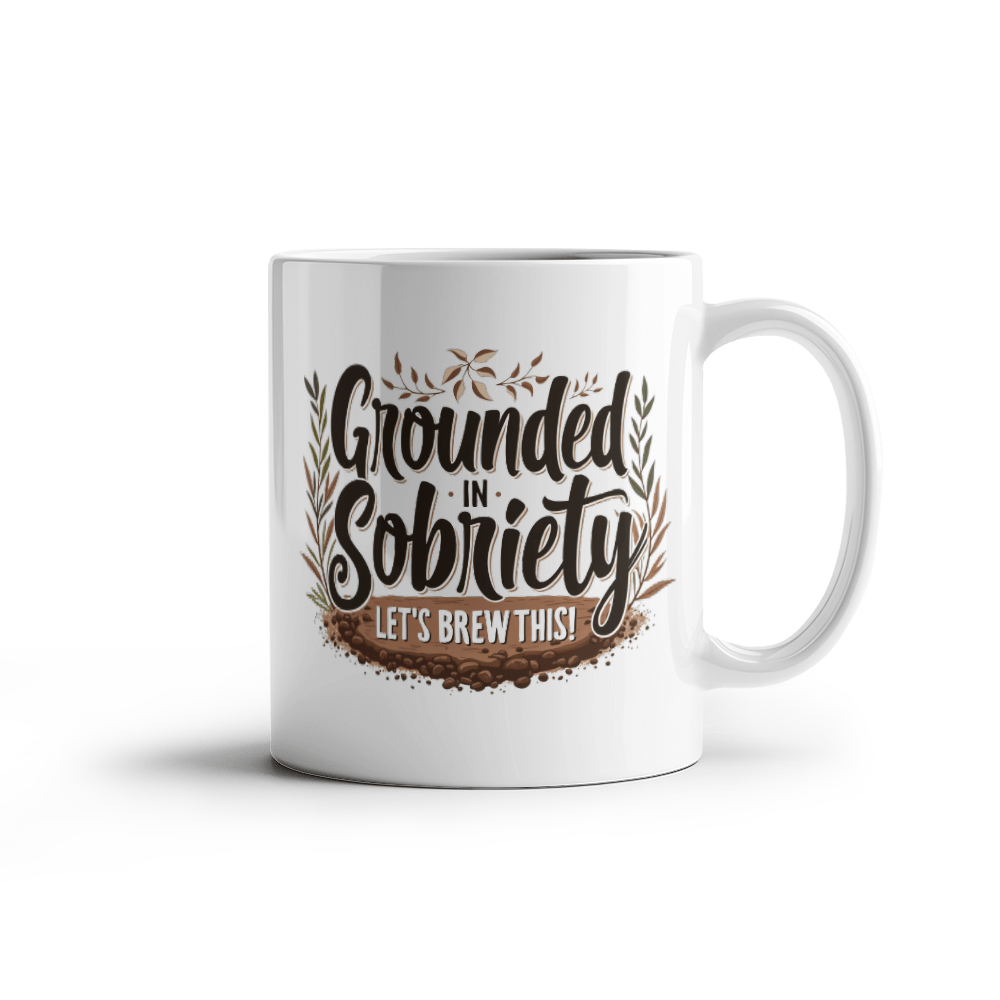 White coffee mug with “Grounded in Sobriety” and “Let’s Brew This!” print on front