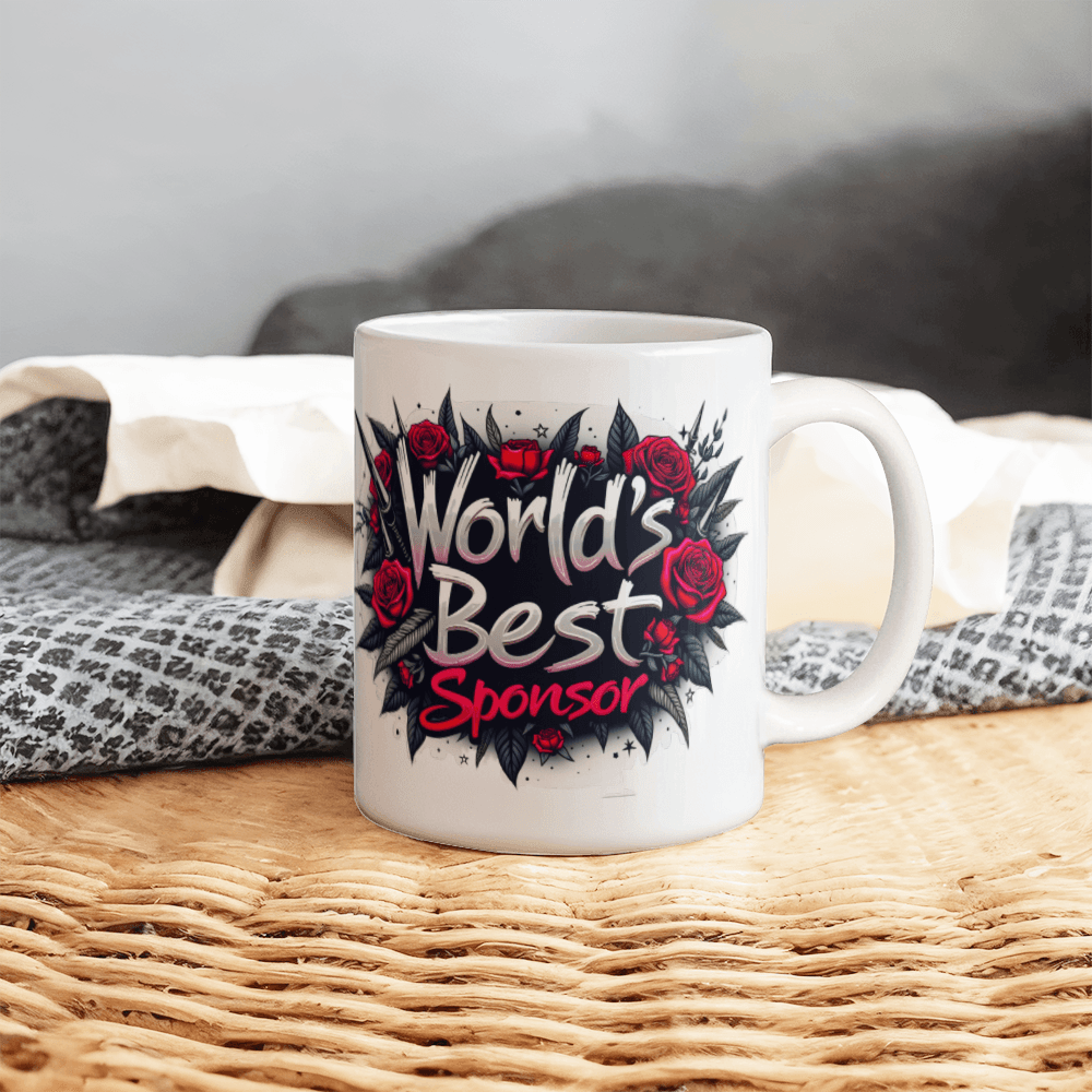White ceramic mug with “World’s Best Sponsor” text, red roses, and black starburst