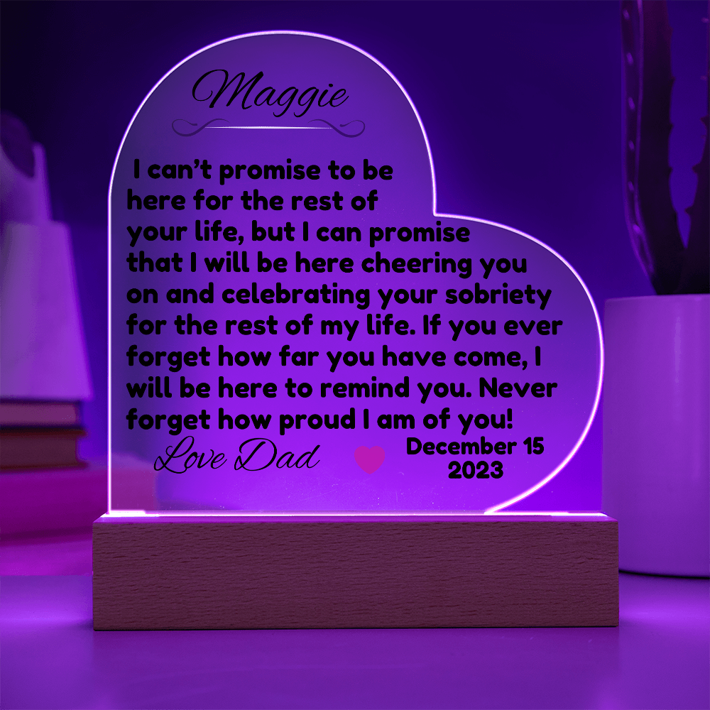 Acrylic LED heart sign with Maggie message, purple glow outline on wooden base