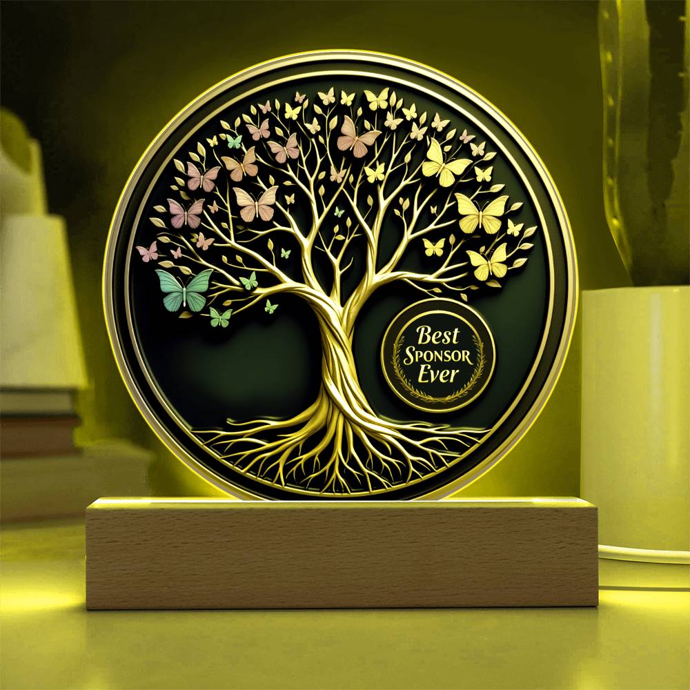 LED circle acrylic keepsake glowing yellow with tree, butterflies, and wood base
