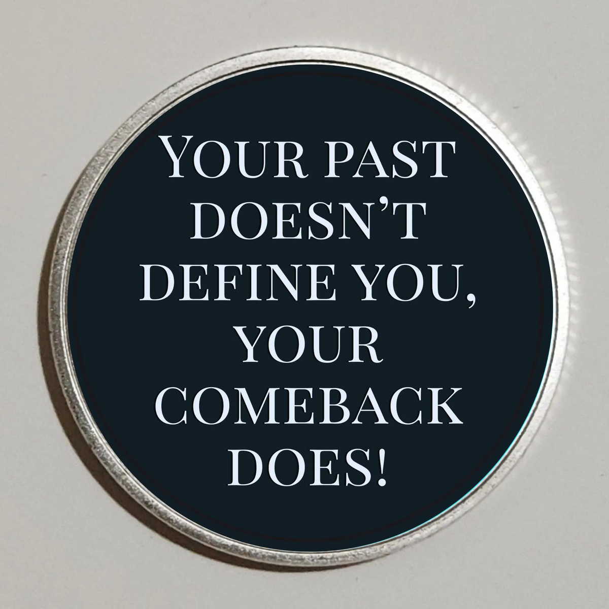 Silver rim Tree of Life coin with quote: YOUR PAST DOESN'T DEFINE YOU, YOUR COMEBACK DOES!