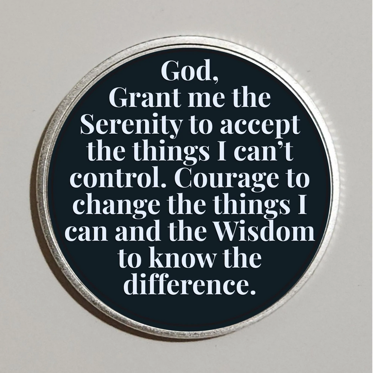 Silver rim Tree of Life coin with Serenity Prayer text on dark teal background