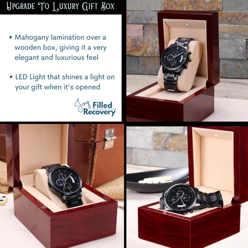 Black chronograph watch in luxury gift box with padded insert and metal bracelet