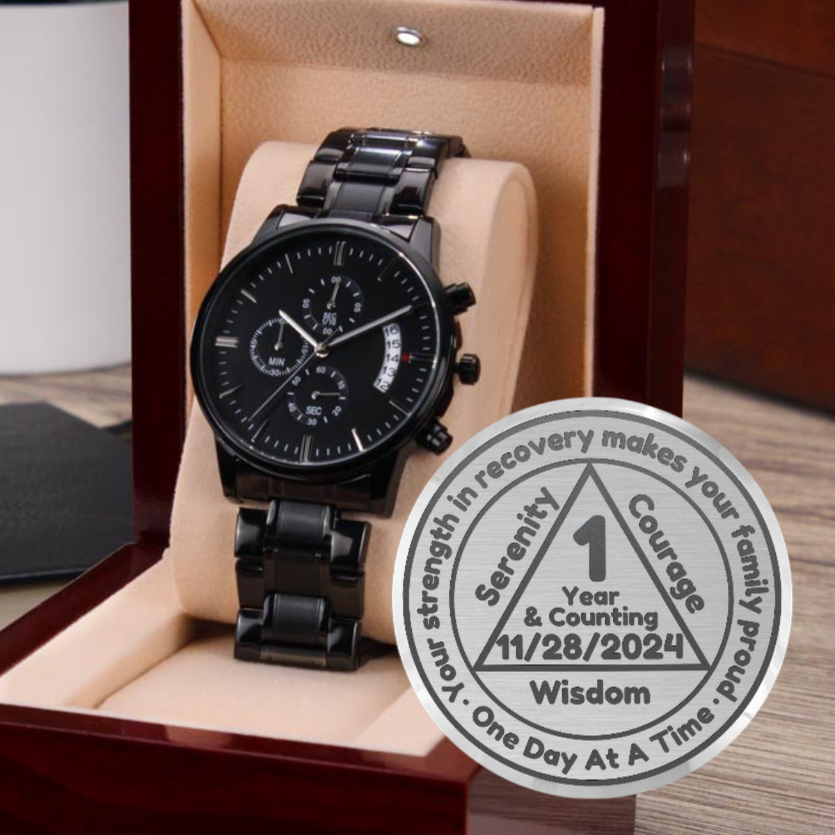 Black chronograph wristwatch in a gift box with a circular recovery sticker